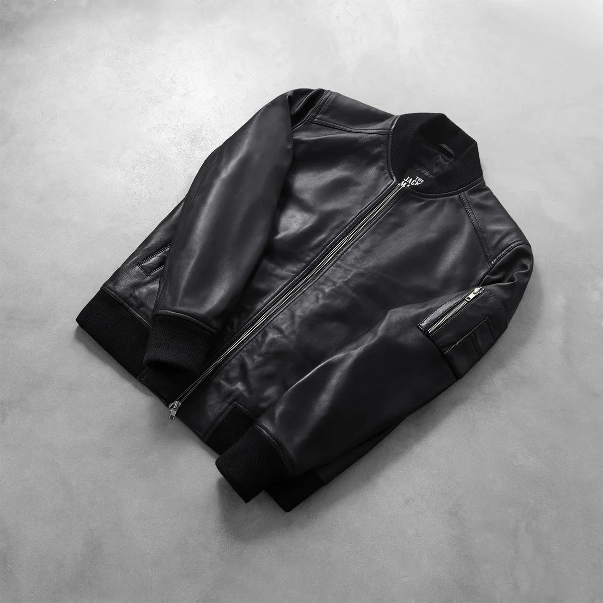 
Rib Knit & Hem Craftsmanship Construction Detail on Men's Bomia Ma-1 Black Leather Bomber Jacket