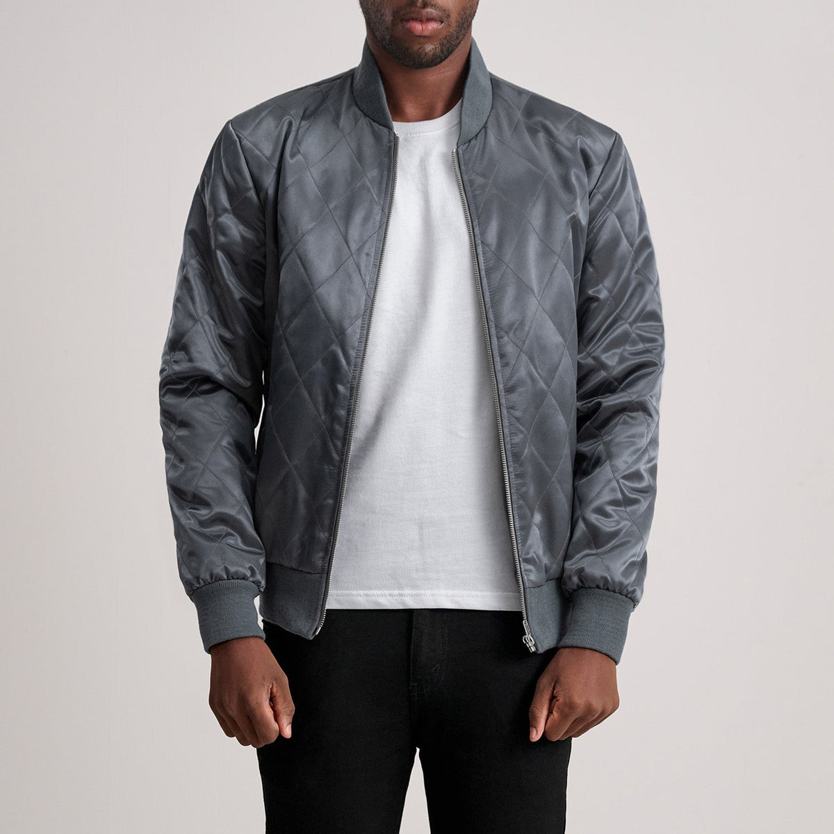 
Danson Quilted Grey Varsity Jacket - Lateral Side Profile View Showing Sleeve Cut & Athletic Taper Fit