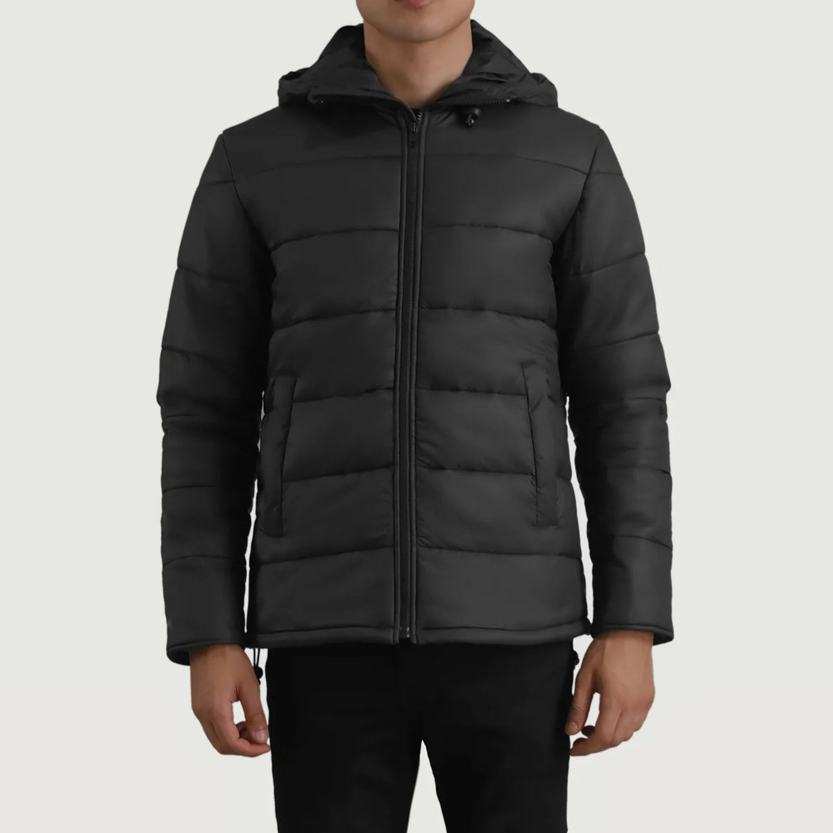 
Erico Black Hooded Puffer Jacket in Black Full-Grain Leather - Front Profile View & Tailored Silhouette | Buy Online
